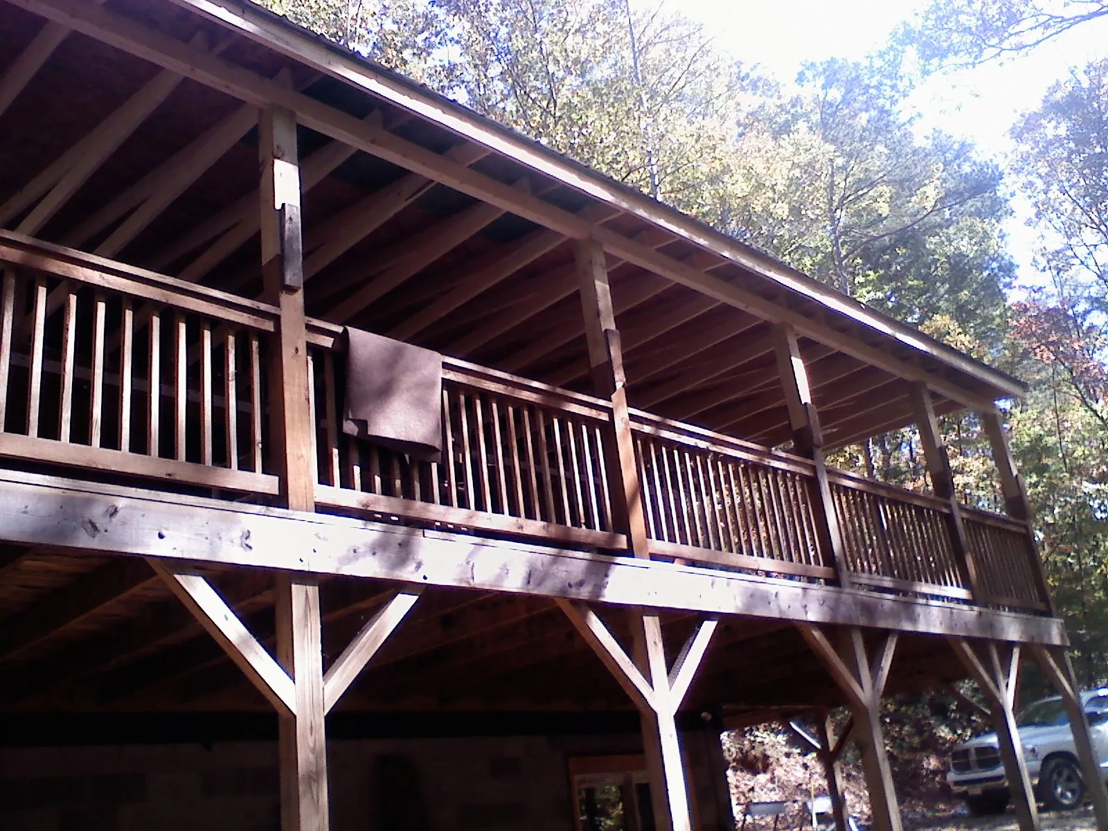 Timber framing under a new elevated porch and deck — Roof Leak Repair in Grapevine by Roofing Brothers